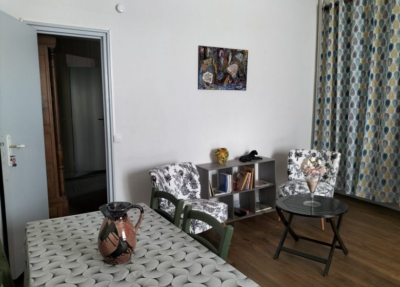 Pièce à vivre, coin repas et salon